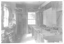 SA0507 - Photograph of a work area with tools and wood., Winterthur Shaker Photograph and Post Card Collection 1851 to 1921c